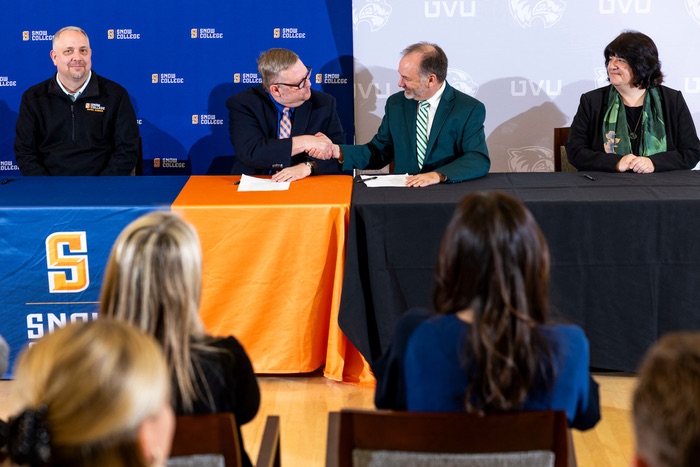 Provost Austin from Snow and Vaught from UVU Shake Hands