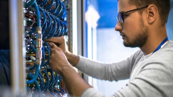 Network Engineer in a rack room